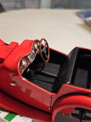 A bit closer of interior, prior to completion, seats, rear area and dash